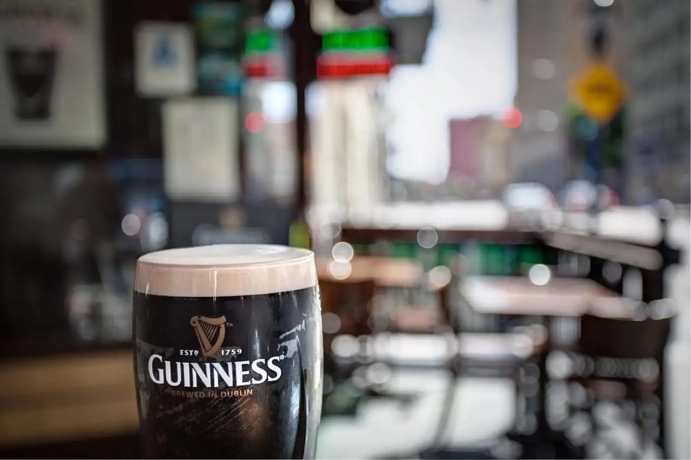 A pint of Guinness on the bar outside Stout
